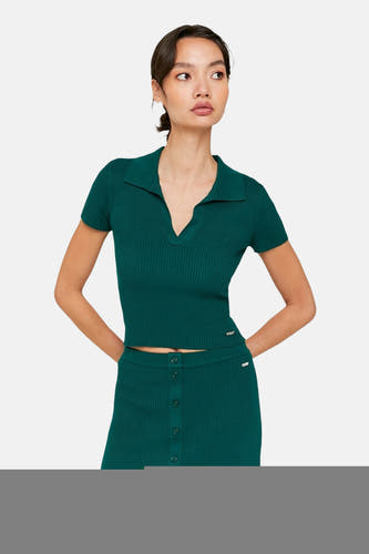 Polo vert de mantes courtes TALLY WEIJL, avec une texture unbre ribcée et une jupe coordonnée.