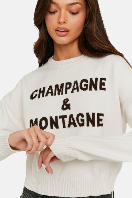 Tally Weijluiui true avec en colon, de " " " & Montagne" dans le brun foncé.