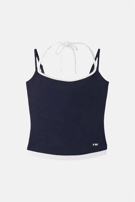 Haut bleu marine à fines bretelles de TALLY WEIJL, avec passepoil blanc, un nœud licou et logo 'TW'.