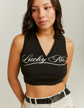 T-shirt sans manches noir de TALLY WEIJL, avec une impression blanche et un col en V.