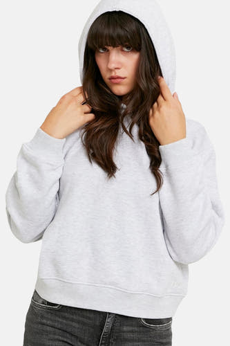 Sweat à capuche gris de TALLY WEIJL, à manches longues et poignets côtelés, porté avec un jean foncé.