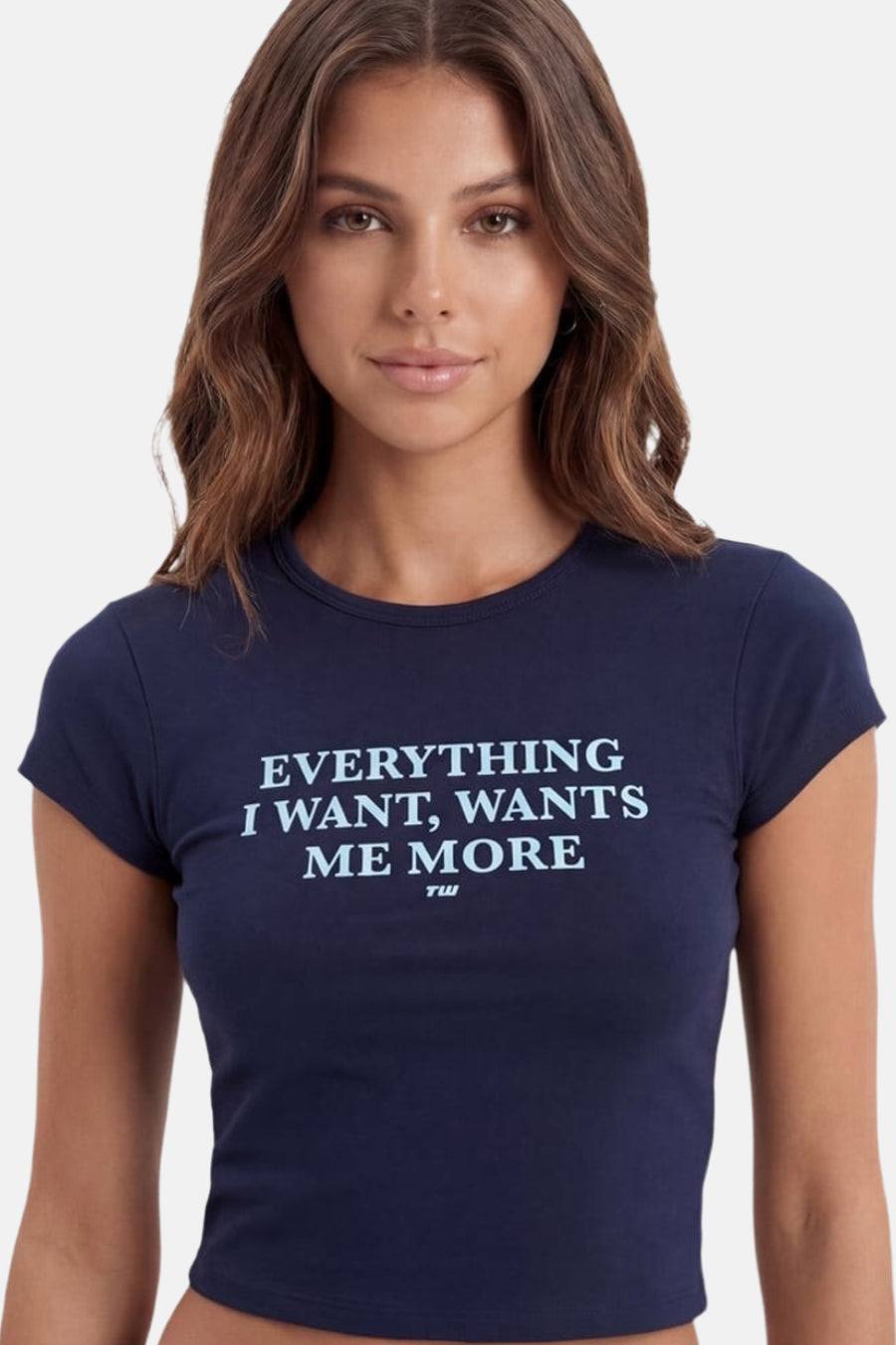 T-shirt bleu ajusté à manches courtes de TALLY WEIJL, imprimé avec le texte 'EVERYTHING I WANT, WANTS ME MORE'.