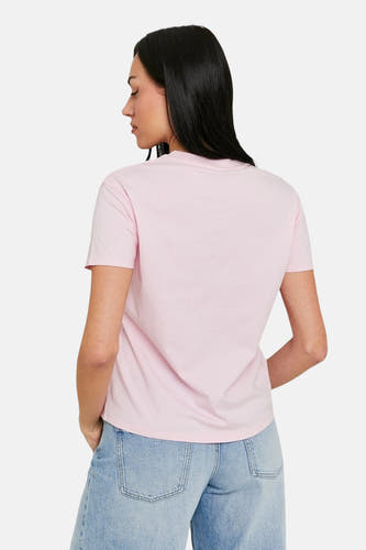 T-shirt rose à manches courtes de TALLY WEIJL, vu de derrière, avec un design simple et associé à des jeans.