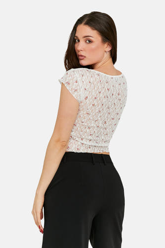 Blouse écru à manches courtes de TALLY WEIJL, avec un motif floral et une texture dentelle.