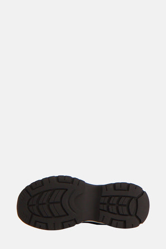 Zwarte schoenzool met grof profiel.
