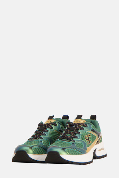 Sneakers verts de SUPERTRASH, vus en vue arrière, avec des accents noirs et dorés sur la semelle.