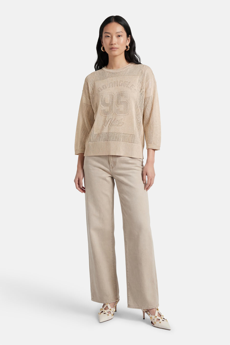 Pull écru ADORE, avec motif "Los Angeles 96" et pantalon long et ample avec talons.