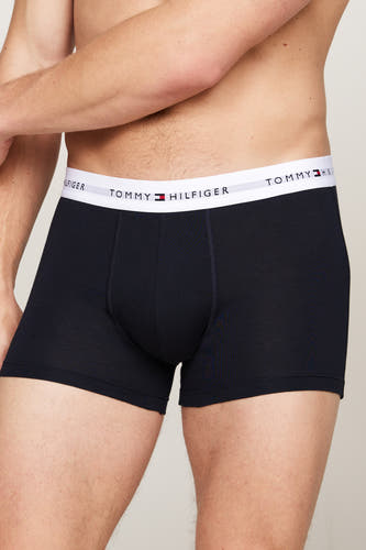 Short deau boxers Tommy TOMMY JEANS avec une ce taille blanche logo logo, en gros plan.