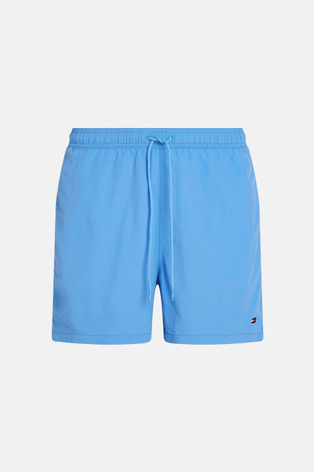 Short de bain bleu Tommy Hilfiger, avec un cordon de serrage et le logo en bas à droite.