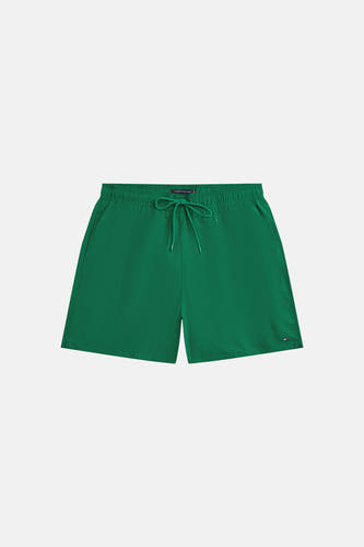 Short de bain vert TOMMY HILFIGER, avec un cordon de serrage et un logo discret sur la jambe.