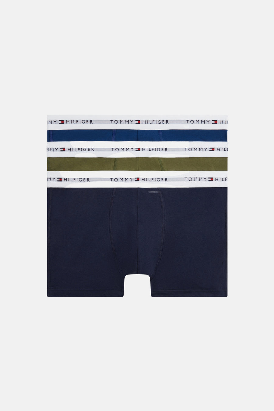 Boxer short bleu de TOMMY JEANS, avec une ceinture élastique blanche et le logo de la marque dessus.