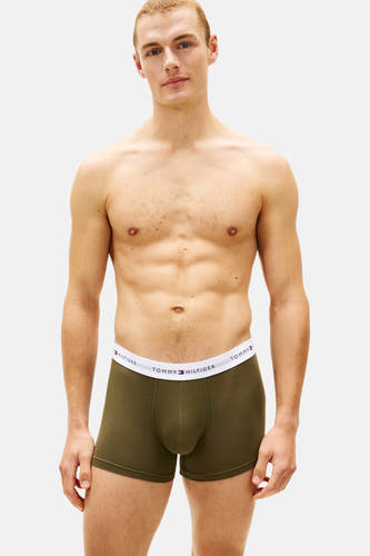 Boxer short vert de TOMMY JEANS, avec une ceinture élastique blanche à imprimé logo.