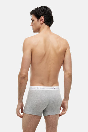 Boxer short gris de TOMMY JEANS, vu de dos avec une ceinture élastique ornée du logo de la marque.