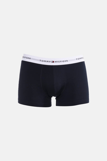 Boxer short bleu de TOMMY JEANS avec une ceinture élastique blanche avec logo de la marque.