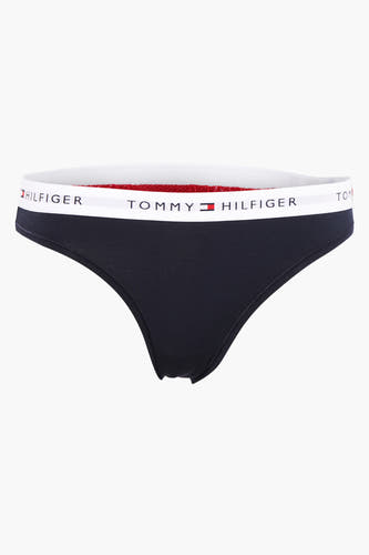 Caleçon bleu de TOMMY JEANS, avec une bande élastique blanche au logo.