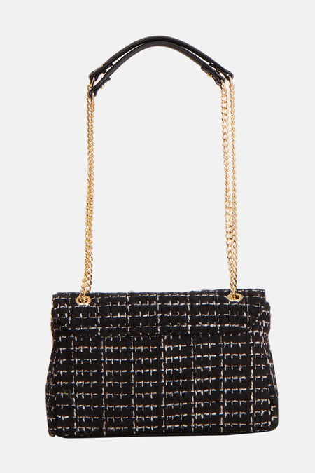 Sac à dos noir de VALENTINO BAGS, avec des anses en chaîne d'or et un motif imprimé.