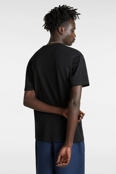 T-shirt noir à manches courtes VANS "OFF THE WALL" à col rond, montré de dos sur un homme avec des dreadlocks.
