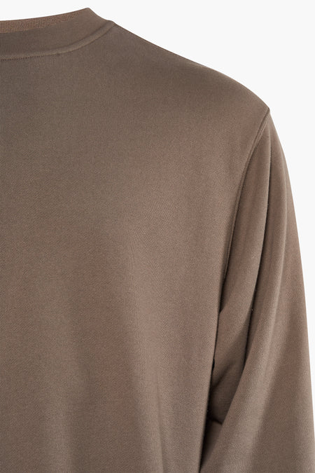 Pull marron à col rond VANS "OFF THE WALL", avec un tricot fin et un col côtelé.