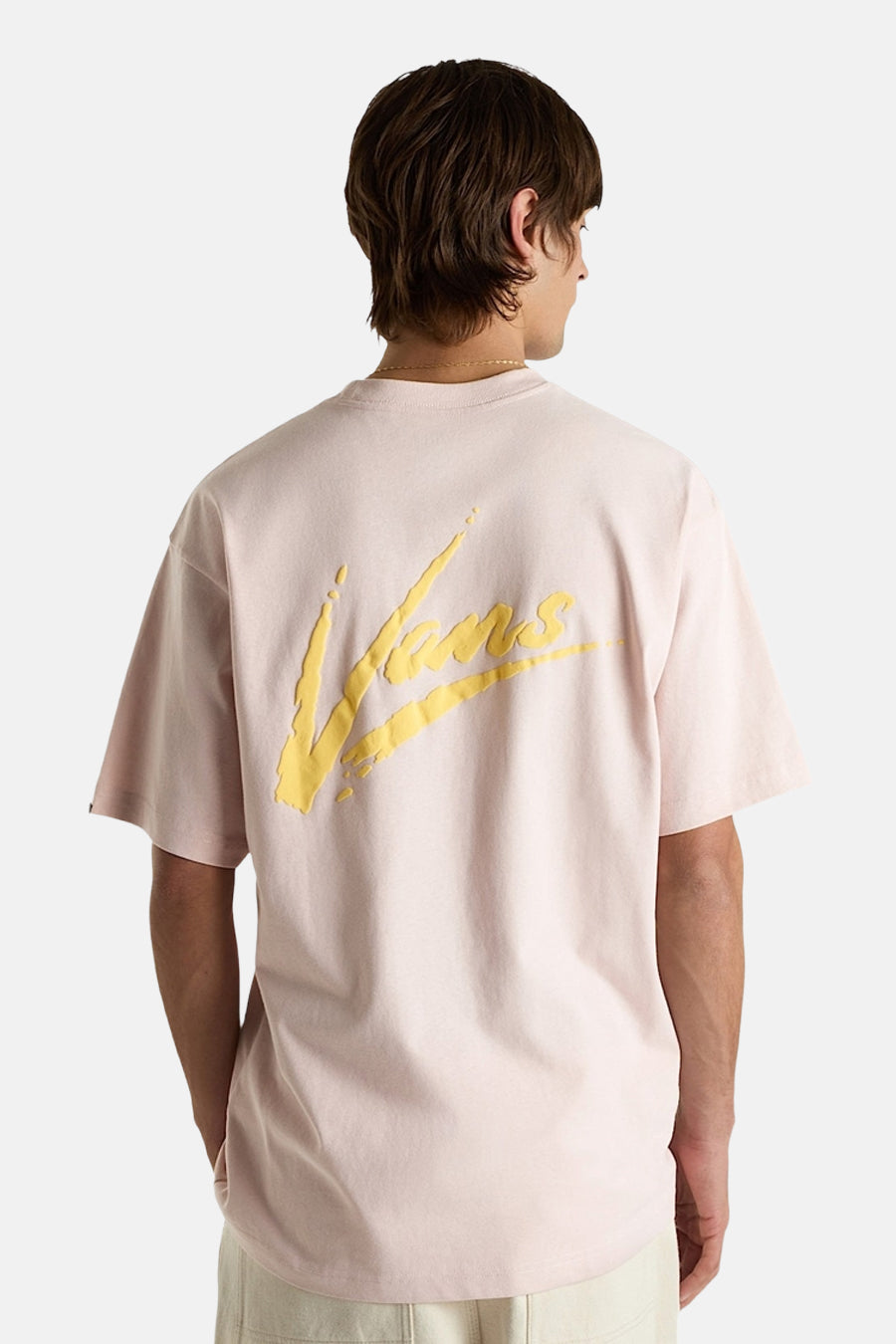 T-shirt rose à manches courtes de VANS "OFF THE WALL", avec impression de texte jaune sur le dos.