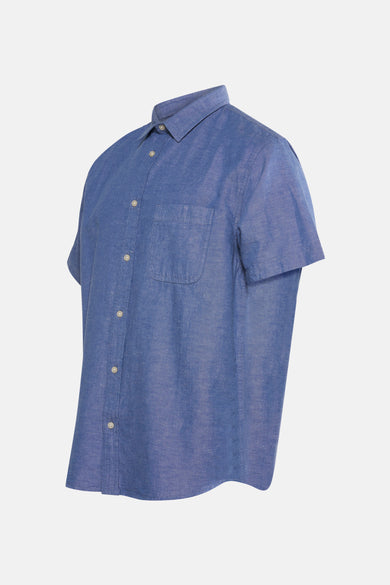 Chemise bleue à manches courtes de VANS "OFF THE WALL", avec col boutonné et poche poitrine.
