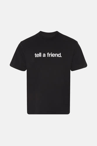 T-shirt noir à manches courtes de VANS "OFF THE WALL", avec une impression blanche sur le vêtement.