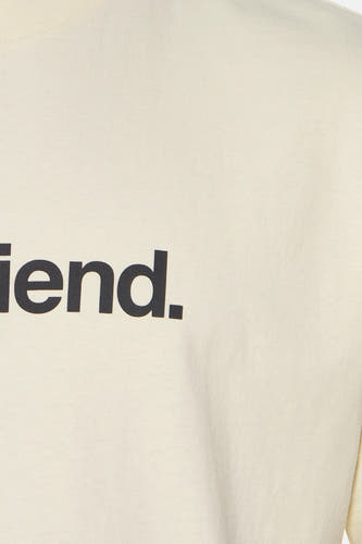 T-shirt jaune à manches courtes de VANS "OFF THE WALL", avec impression de texte noire sur l'avant.