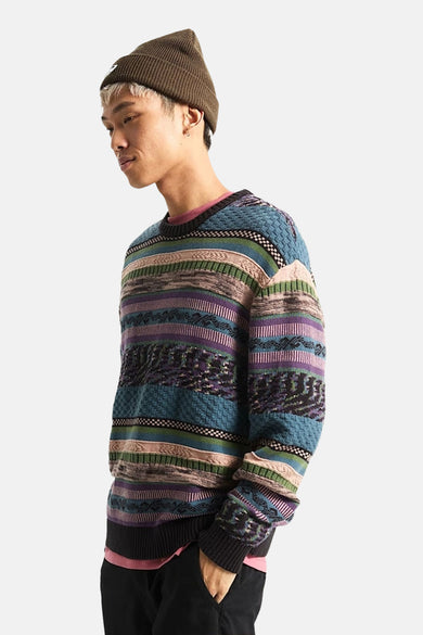 Sweat-shirt multicolore à col rond de VANS "OFF THE WALL", avec divers motifs rayés.