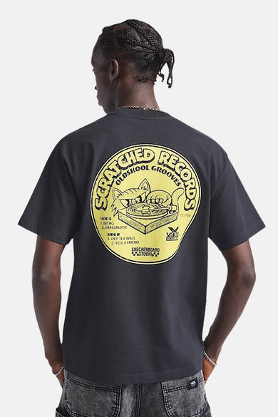 T-shirt noir à manches courtes de VANS "OFF THE WALL", avec une impression graphique sur le dos.