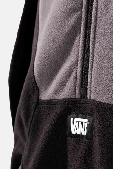 Fleece noir de VANS, avec une partie supérieure grise et un logo cousu.