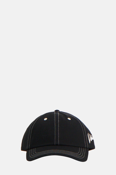 Chapeau noir de VANS "OFF THE WALL", avec des coutures contrastantes et un logo brodé.