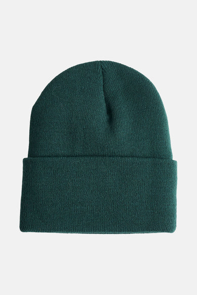 Casquette verte de VANS "OFF THE WALL" avec une texture tricotée et un bord replié.