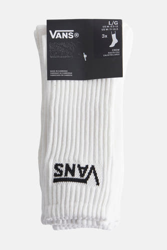 Witte sokken van Vans met een ribgebreide textuur en een zwart logo.
