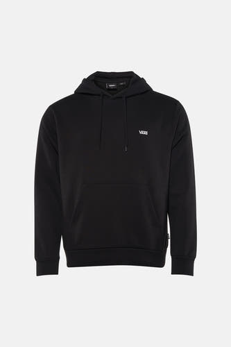 Sweatshirt noir à capuche de VANS, avec cordons de serrage et une poche kangourou à l'avant, combiné avec un jean gris et des baskets basses.