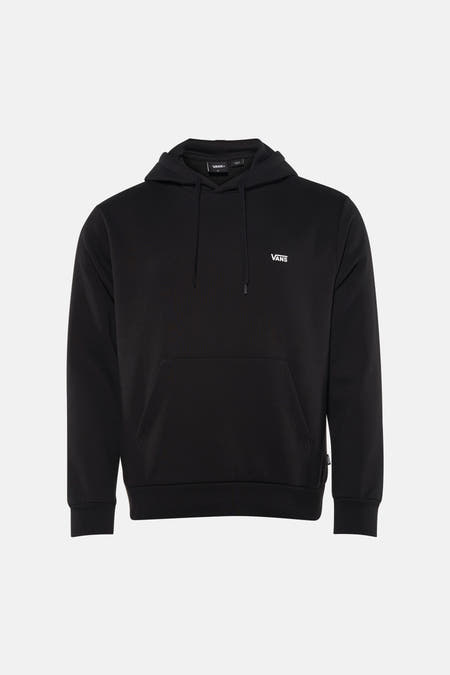 Sweatshirt noir à capuche de VANS, avec cordons de serrage et une poche kangourou à l'avant, combiné avec un jean gris et des baskets basses.