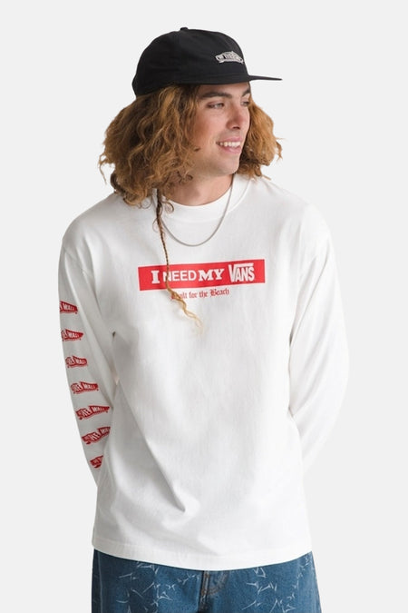 T-shirt blanc à manches longues VANS "OFF THE WALL", avec texte rouge sur la poitrine et les manches.
