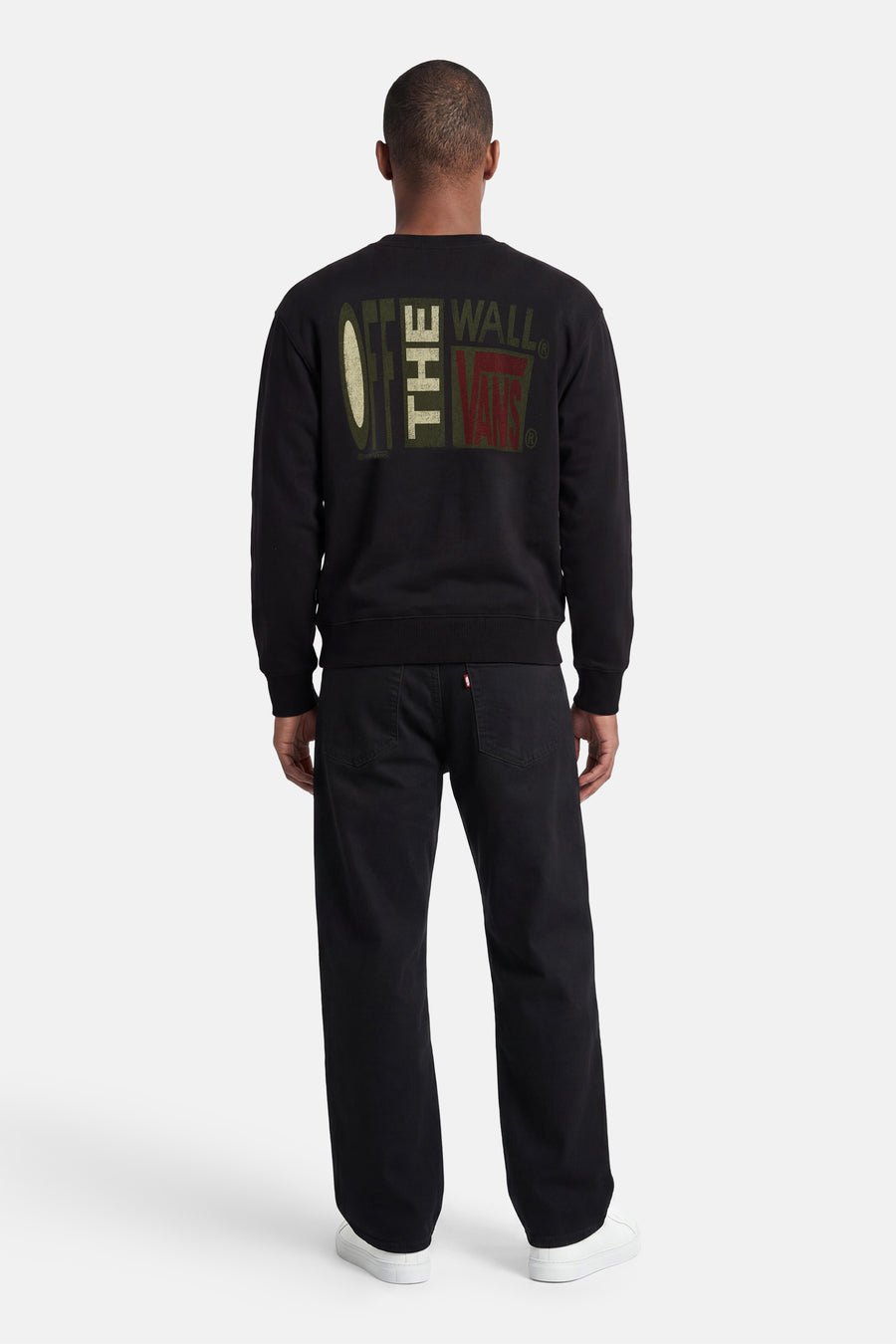 Zwarte sweater met ronde hals van VANS “OFF THE WALL” met opvallende grafische print op de rug.