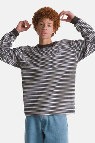 T-shirt Vans multicolore à manches longues, avec rayures horizontales et une chaîne argentée.