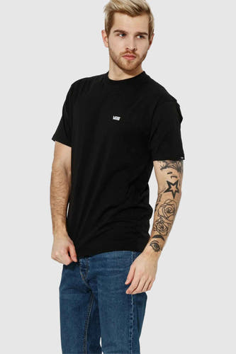 T-shirt noir VANS "OFF THE WALL", dos d'un homme en jeans.