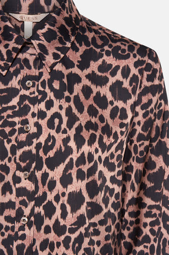Blouse brune à longues manches de Guess, avec un imprimé léopard.