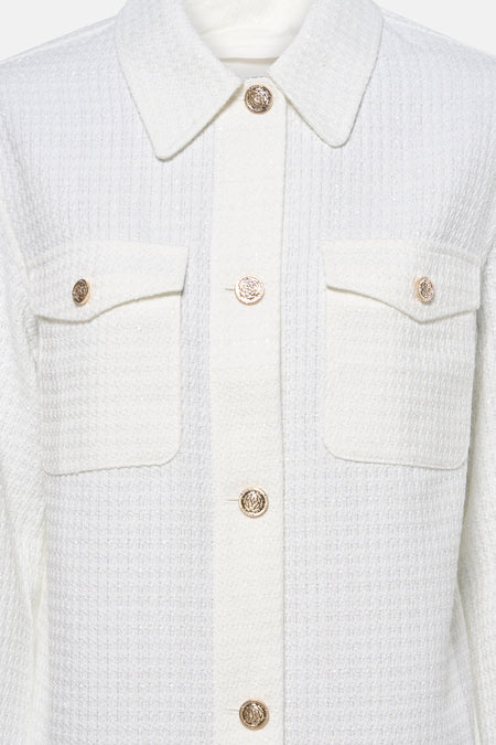 Chemise blanche Guess®, avec boutons dorés et poches poitrine.