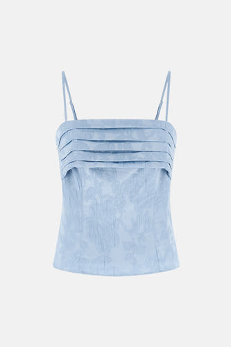 Blouse sans manches bleue de Guess®, avec une subtile impression de fleurs et un zip à l'avant.