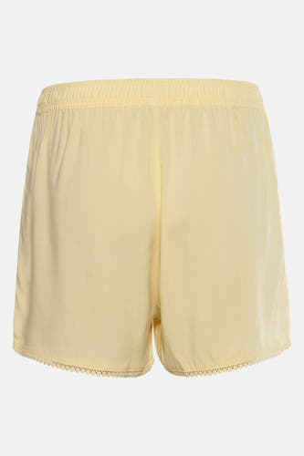 Short jaune de HAILYS, avec une ceinture élastique et des détails sur les bords en bas.