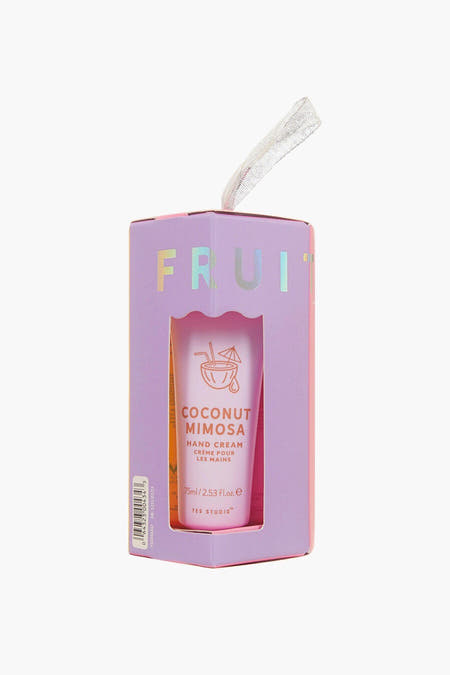 Crème pour les mains multicolore d'UPPER CANADA, emballée dans une boîte de carton violette avec un ruban argenté.