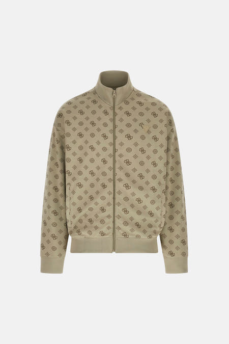 Gilet beige Guess avec un imprimé monogramme intégral et un col montant.